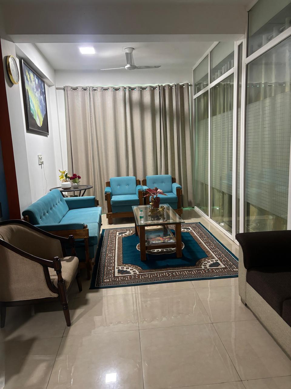 A group of individuals lying in a guided relaxation session at a wellness center